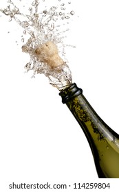 Bottle Of Champagne Popping Its Cork And Splashing