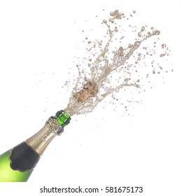 bottle of champagne popping its cork and splashing isolated on white background