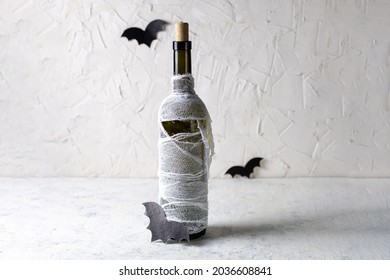 Bottle Of Cocktail Decorated As Mummy. Drink For A Halloween Party For Kids.