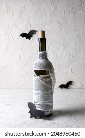 Bottle Of Cocktail Decorated As Mummy. Drink For A Halloween Party For Kids.