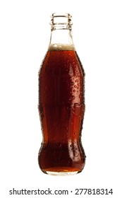 A Bottle Of Cola Soda Isolated On A White Background