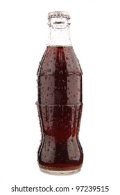 A Bottle Of Cola Soda Isolated On A White Background