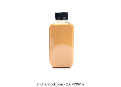 bottle of cold beverage drink with tea milk, fresh breakfast sweet refreshment with ice, hot drink coffee and delicious tasty in glasses, green latte and brown chocolate with white cream isolated