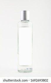 Bottle Of Cologne Isolated Over A White Background.