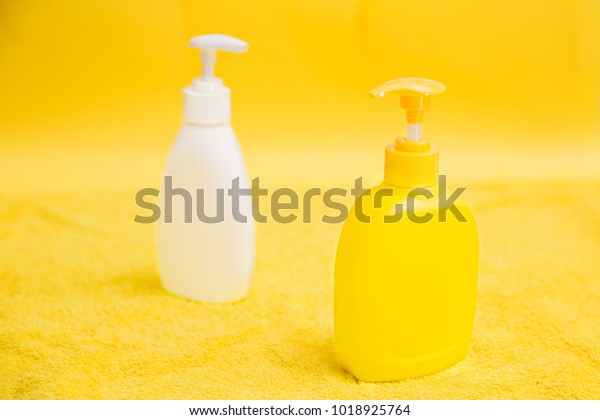 Download Bottle Detergent On Yellow Background Royalty Free Stock Image PSD Mockup Templates