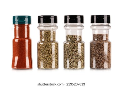 Bottle with different spices and herbs isolated on white background.