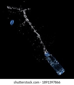 Bottle Of Drinking Water Splashing Out Isolated On Black