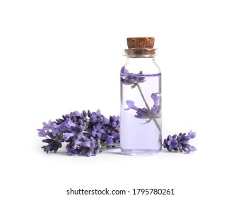 Bottle of essential oil and lavender flowers on white background - Shutterstock ID 1795780261