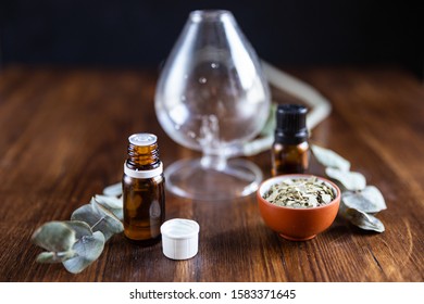 Bottle Of Eucalyptus Essential Oil Opened, With Diffuser