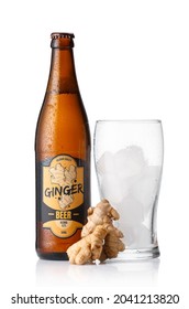 Bottle Of Fresh Ginger Beer And Glass On White Background