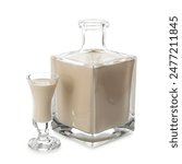 Bottle and glass of coffee cream liqueur isolated on white