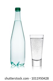 Bottle And Glass With Healthy Sparkling  Water Lemonade With Bubbles On White