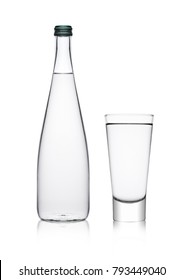 Bottle And Glass With Healthy Sparkling  Water Lemonade With Bubbles On White