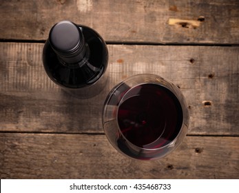 Bottle And Glass Of Red Wine , View From Above