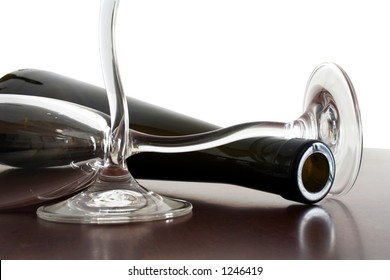 Bottle and Glasses on table