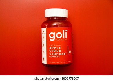 A Bottle Of Goli Apple Cider Vinegar Gummies On Red Background As The New Staple In Daily Supplements On June 15, 2020