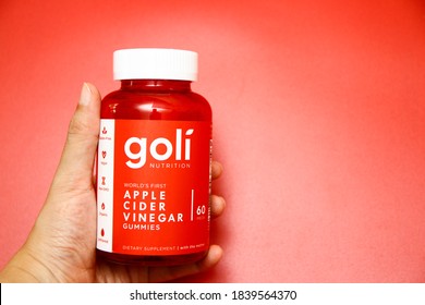 A Bottle Of Goli Apple Cider Vinegar Gummies On Red Background As The New Staple In Daily Supplements On June 15, 2020