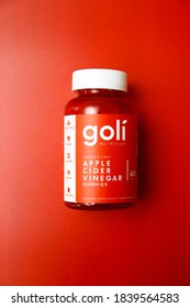 A Bottle Of Goli Apple Cider Vinegar Gummies On Red Background As The New Staple In Daily Supplements On June 15, 2020