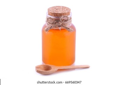 Bottle of Honey on White Background