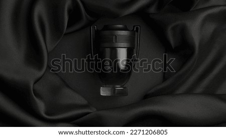 Bottle of luxurious perfume and silk fabric on black background, top view