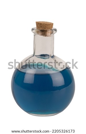 Bottle of magic potion isolated on a white background. Cut out.