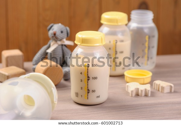 bottle of mother breast milk, breast milk storage\
and handling concept