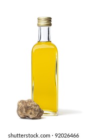 Bottle Of Olive Oil With Fresh White Truffle Isolated On White Background