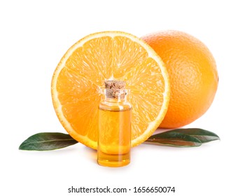 Bottle of orange essential oil on white background