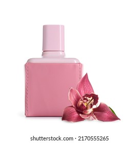 Bottle of perfume and orchid flower on white background