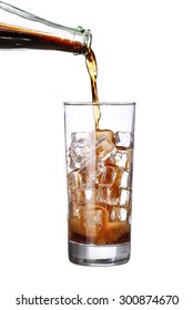 Bottle Pouring Coke In Drink Glass With Ice Cubes Isolated On White Background