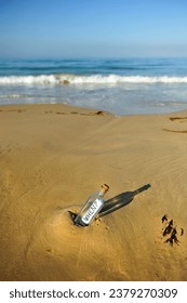 When? Bottle with a question inside found on the shore of the beach. Even when? When will it happen? Uncertainty concept