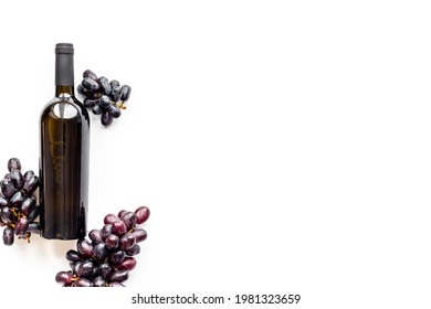 Bottle Red Wine Isolated With Bunch Of Grape. Overhead View