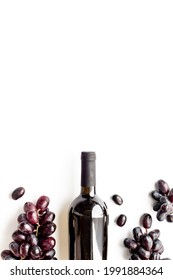 Bottle Red Wine Isolated With Bunch Of Grape. Overhead View