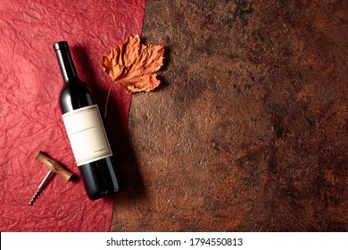 A Bottle Of Red Wine With An Old Empty Label. View From Above. Copy Space. 