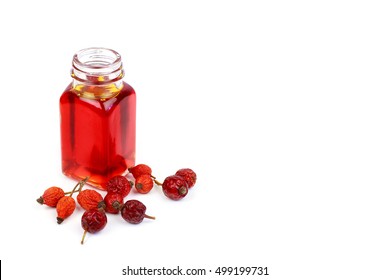 Bottle Of Rose Hip Oil On White Background

