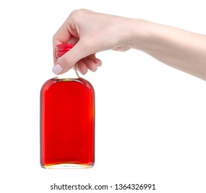 Bottle Rosehip Syrup In Hand On White Background Isolation