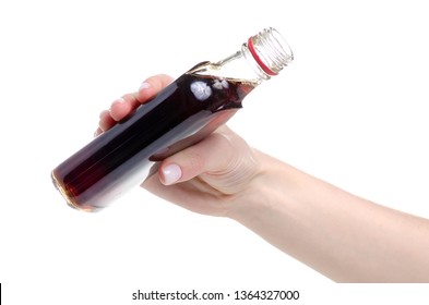 Bottle Rosehip Syrup In Hand On White Background Isolation