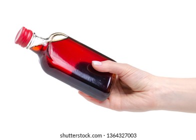 Bottle Rosehip Syrup In Hand On White Background Isolation