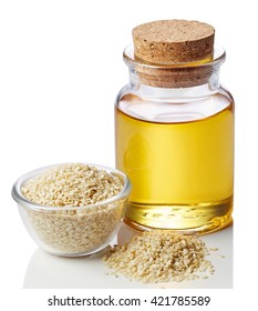 Bottle Of Sesame Oil And Sesame Seeds Isolated On White Background