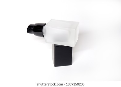 
A Bottle Of Skin Care Products On A White Background/square Pump Bottle Mockup