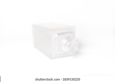 
A Bottle Of Skin Care Products On A White Background/square Pump Bottle Mockup