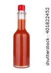 Bottle of spicy, red hot sauce isolated on white background
