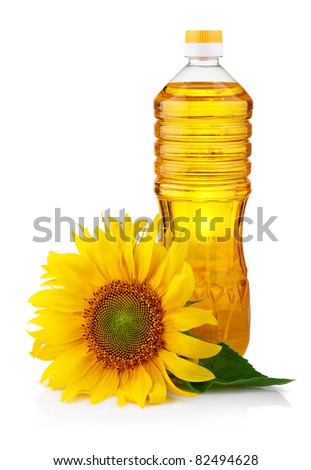 Bottle of sunflower oil with flower isolated on white background