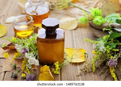 bottle of syrup, honey and herbs - Shutterstock ID 1489763138