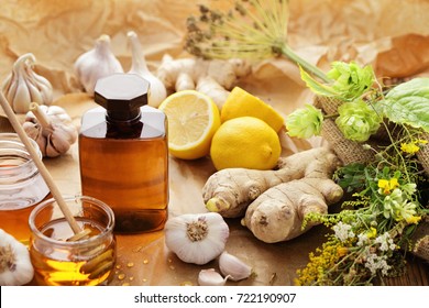 bottle of syrup, honey and herbs. alternative medicine