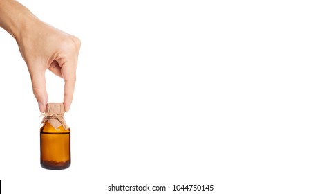 Bottle With Tincture In Hand Isolated On White Background. Copy Space, Template.