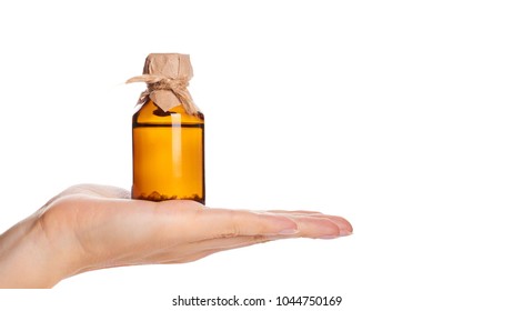 Bottle With Tincture In Hand Isolated On White Background. Copy Space, Template.