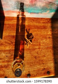 Bottle Of Whiskey With Long Shadow. Bournemouth Dorset England UK. 23 December 2019.