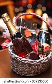 Bottle Of Wine In Basket. Gift For Holiday