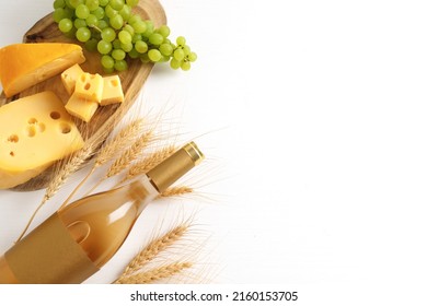 Bottle Of Wine, Cheese Slices And Grapes On A Wooden Board, Talit, Tora. The Concept Of The Israeli Holiday Shavuot